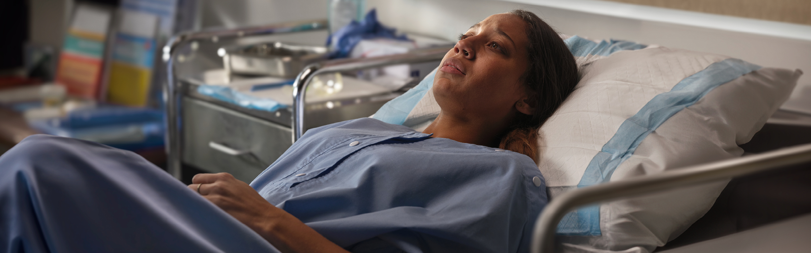 Woman in hospital bed