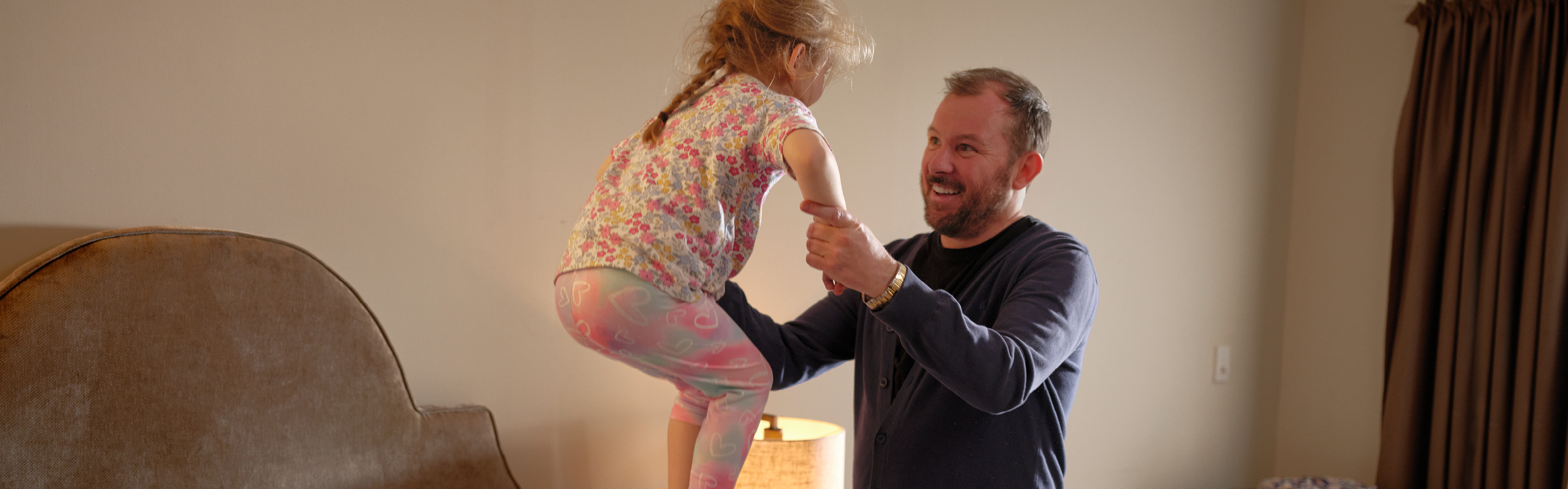 Father playing with daughter